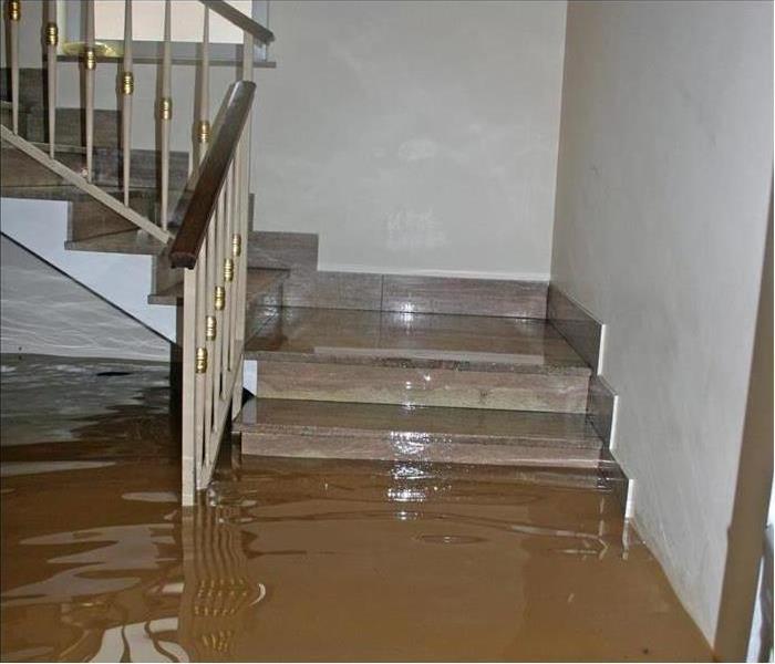 Why SERVPRO - image of flooded stairs