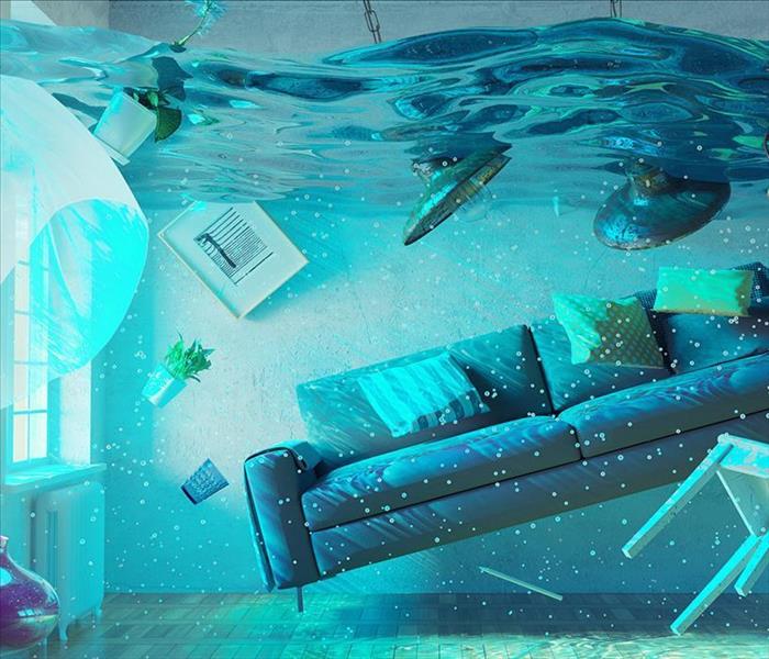 A living room full of water up to the ceiling.